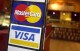 Visa, Mastercard settle long-running antitrust suit over swipe fees with merchants