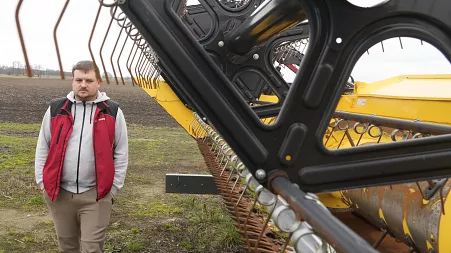 With unsold grain piled high, a Polish farmer faces an uncertain future as war in Ukraine grinds on