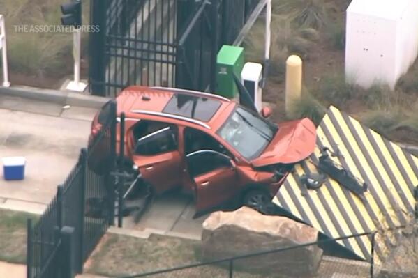 FBI says a driver rammed a vehicle into the front gate of its Atlanta office