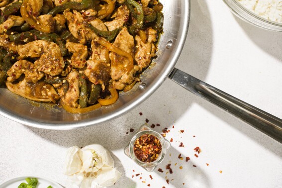 For an easy, flavorful stir-fry, combine chicken breasts, bell peppers and umami-rich hoisin