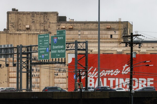 Biden is touring collapsed Baltimore bridge where recovery effort has political overtones