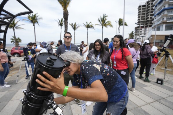 Huge crowds await a total solar eclipse in North America. Clouds may spoil the view