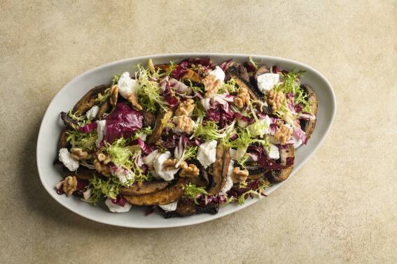 Tangy goat cheese balances meaty mushrooms in a simple vegetarian salad