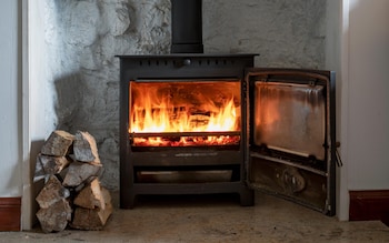 SNP ban on wood-burning stoves in new homes ‘shows contempt for rural Scotland’