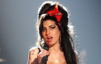 Remembering Amy Winehouse’s fashion legacy, from beehives to ballet flats