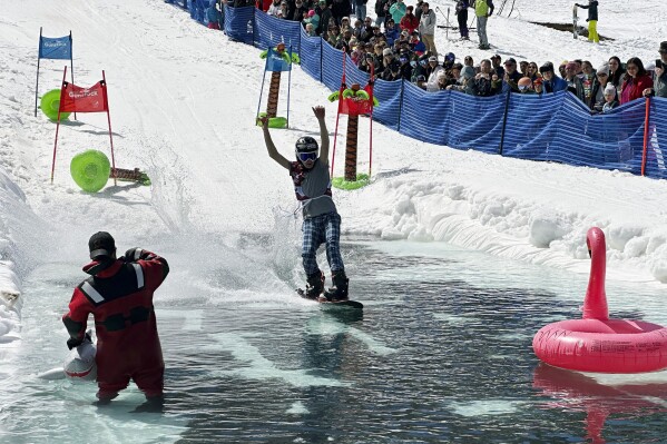 Soar, slide, splash? It’s skiers’ choice as spring’s wacky pond skimming tradition returns