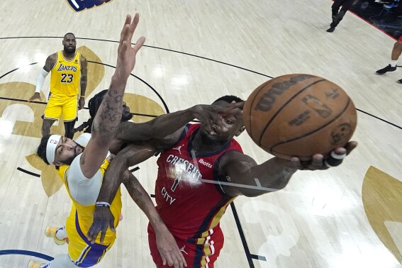 Putting in the extra work allows an AP photographer to make a soaring NBA shot