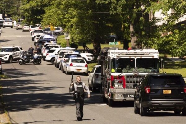 3 law officers serving warrant are killed, 5 wounded in shootout at North Carolina home, police say