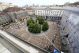 Mock coffins fill a square in Milan in a protest over workplace safety in Italy