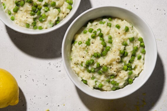 Frozen peas and lemon add complexity to this weeknight-friendly risotto