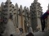 In Mali, thousands replaster the Great Mosque of Djenne, under threat from conflict