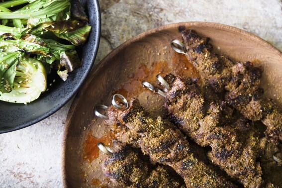 Sizzling, twice-spiced beef skewers add a twist to a Memorial Day barbecue