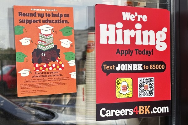 US applications for jobless benefits fall as labor market continues to thrive