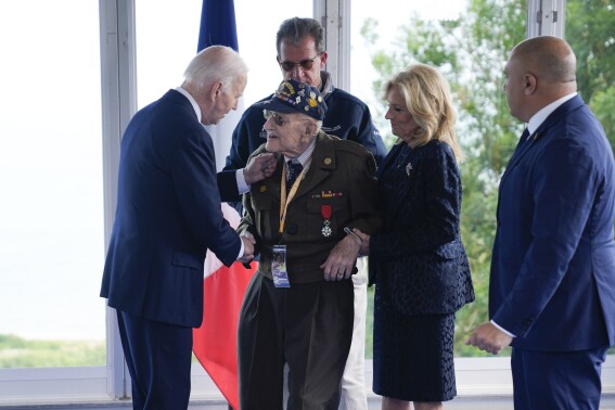 Biden calls for solidarity with Ukraine at D-Day anniversary ceremony near the beaches of Normandy