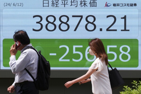 Stock market today: Asian shares are mixed ahead of a Fed decision on interest rates