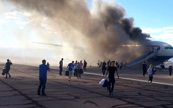 Grabbing luggage from a plane in an emergency risks lives