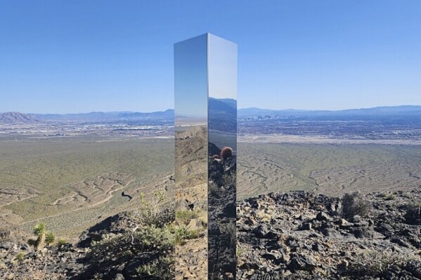 Shiny monolith removed from mountains outside Las Vegas. How it got there is still a mystery