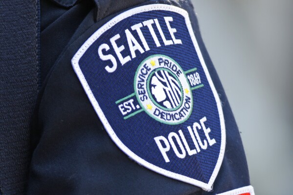 Washington high court to decide if Seattle officers who attended Jan. 6 rally can remain anonymous