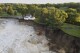 Minnesota family store is demolished from its perch near dam damaged by surging river