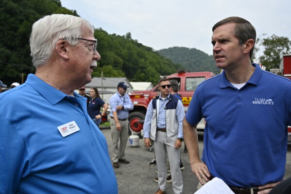 Beshear gets a warm embrace in flood-stricken parts of Kentucky where he and Trump are both popular