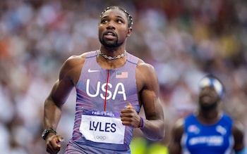 How Noah Lyles became fashion’s most in-demand man – hair pearls and all