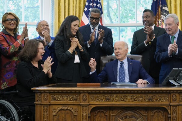 Biden signs order to establish 1908 Springfield race riot monument as he looks to burnish legacy