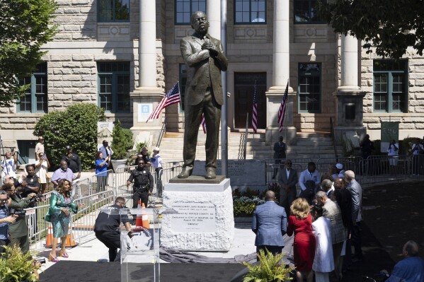 Crowd on hand for unveiling of John Lewis statue at spot where Confederate monument once stood