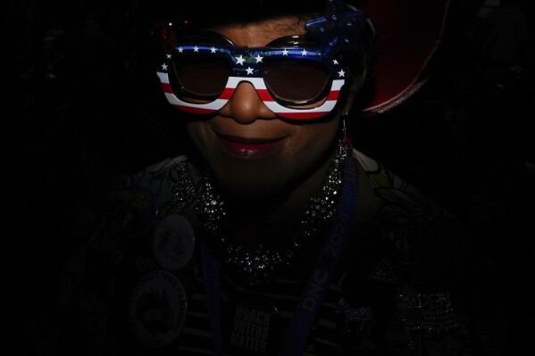 Using some ingenuity with a flash, an AP photographer gets to the red, white and blue of a portrait