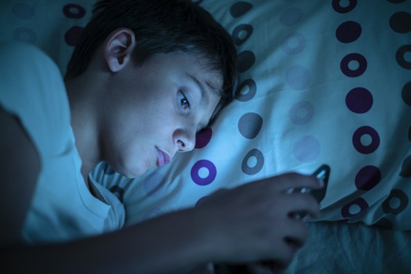 Kids: Screen Time Before Bed Affects Sleep Differently Than Thought