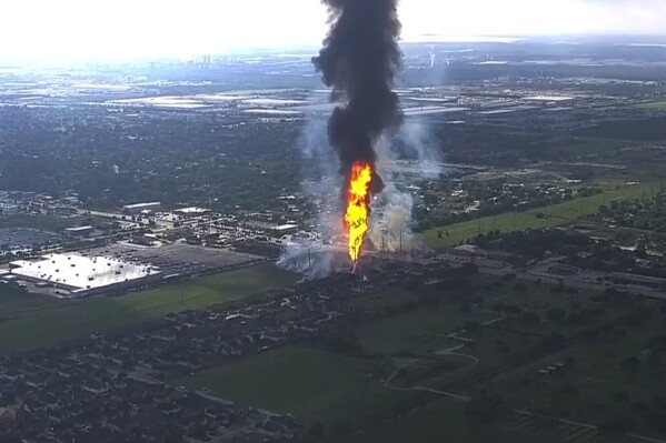 A pipeline has exploded and is on fire in a Houston suburb, forcing evacuations