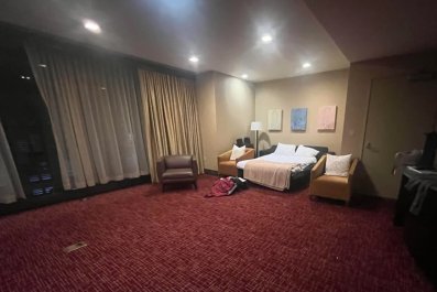 Guests Sleep in Conference Area After Hotel They Booked Runs Out of Rooms