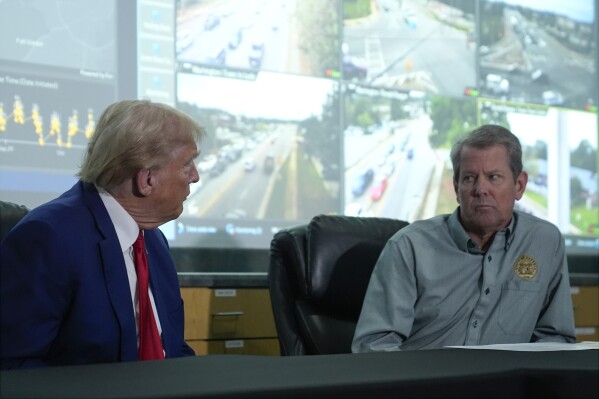 Donald Trump and Georgia Gov. Brian Kemp use hurricane recovery to make first appearance together