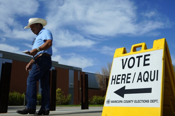 Early in-person voting begins in Arizona, drawing visits from the presidential campaigns