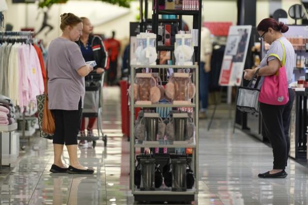 US shoppers spent more at retailers last month in latest sign consumers are driving growth