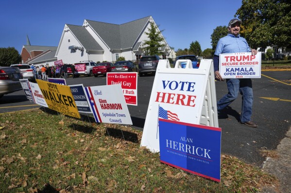 North Carolina early voters, still recovering from Helene, top turnout in 2020