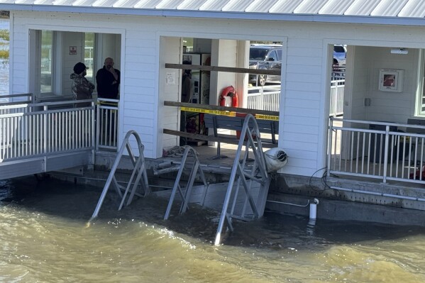 Eyewitness video captures frantic efforts to save lives after deadly collapse of dock walkway