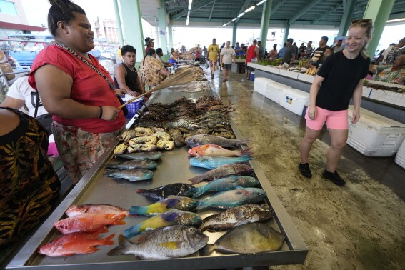 A Samoan village prepares to welcome King Charles but fears an uncertain future for its reef