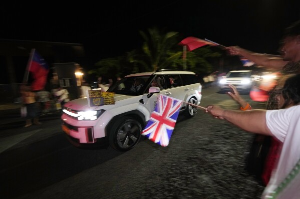 Charles gets a warm welcome on his first visit as king to Samoa. But uneasy questions await