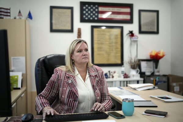 The top election official in a politically crucial Nevada county says she was forced out