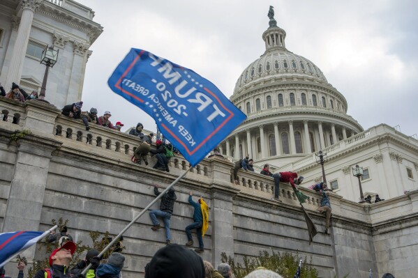 Man who smashed door moments before officer killed Capitol rioter gets 8 years in prison